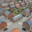 Quartier résidentiel en Wallonie illustrant la transition vers la performance énergétique PEB